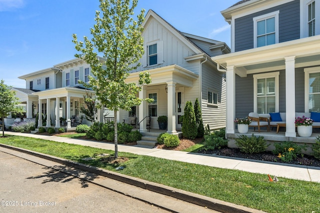 6115 Passionflower Dr, Prospect, KY 40059 - view of front of home with covered porch and board and batten siding