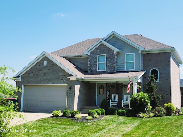 12630 Orell Station Pl, Louisville, KY 40272 - view of front facade featuring covered porch, a garage, brick siding, a front yard, and concrete driveway