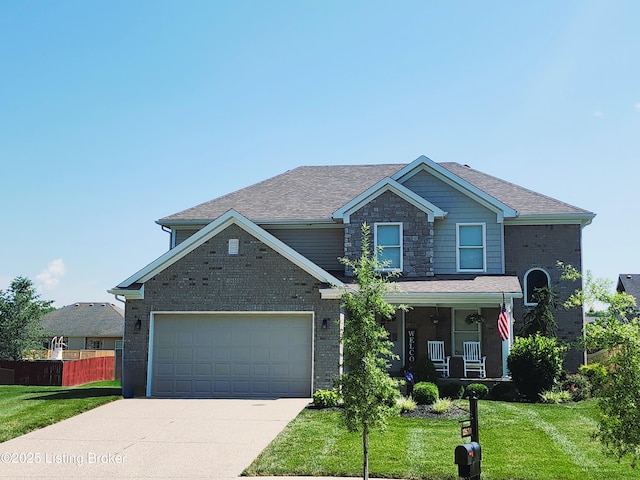 12630 Orell Station Pl, Louisville, KY 40272 - view of front of property featuring covered porch, concrete driveway, brick siding, an attached garage, and roof with shingles