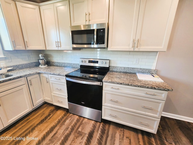 12630 Orell Station Pl, Louisville, KY 40272 - kitchen with stainless steel appliances, dark wood-type flooring, and backsplash