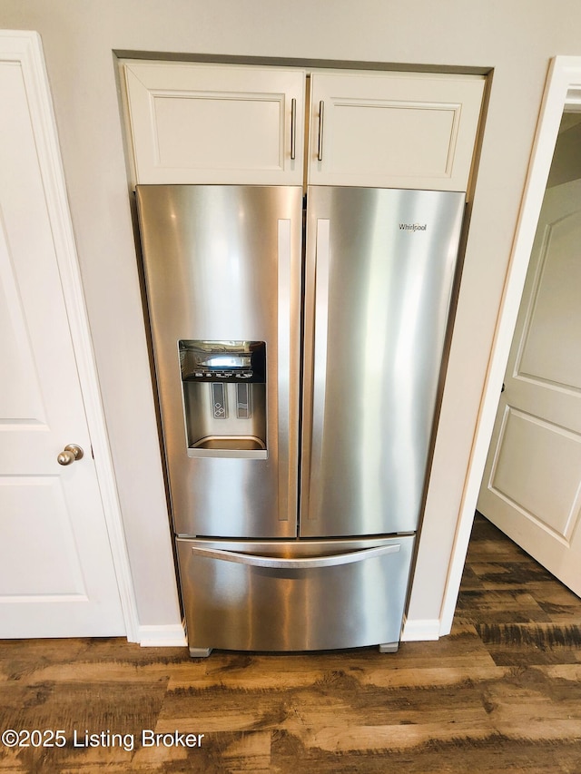 12630 Orell Station Pl, Louisville, KY 40272 - kitchen view of stainless steel fridge with ice dispenser, dark wood-style flooring, and white cabinets