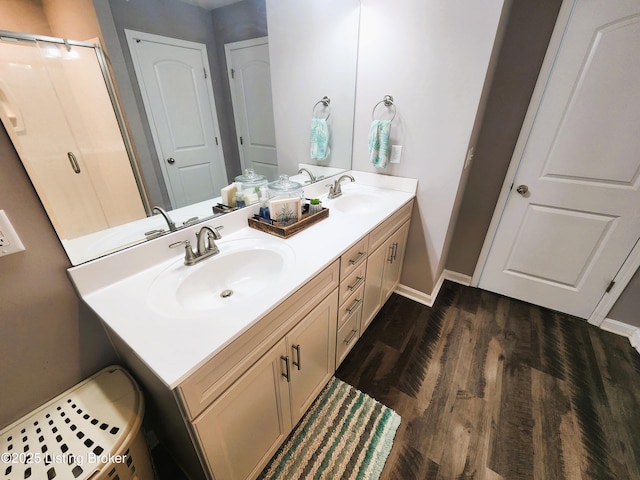 12630 Orell Station Pl, Louisville, KY 40272 - full bathroom featuring double vanity, wood finished floors, and a stall shower