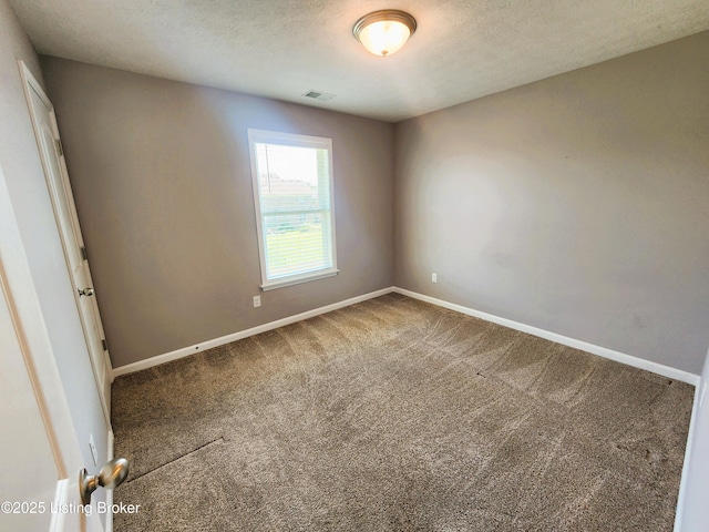 12630 Orell Station Pl, Louisville, KY 40272 - unfurnished room with carpet flooring and a textured ceiling