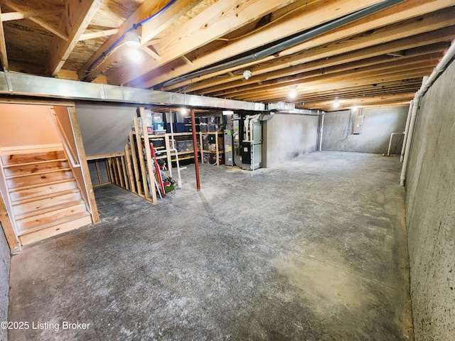 12630 Orell Station Pl, Louisville, KY 40272 - unfinished below grade area featuring stairs, electric panel, and heating unit