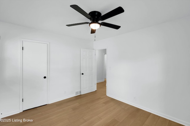 3407 Hillsboro Rd, Louisville, KY 40207 - unfurnished bedroom with light wood-type flooring and ceiling fan