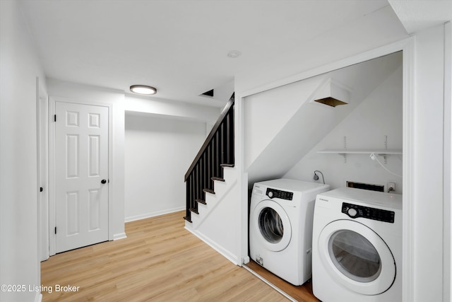 3407 Hillsboro Rd, Louisville, KY 40207 - laundry room featuring light wood-style floors and washer and dryer
