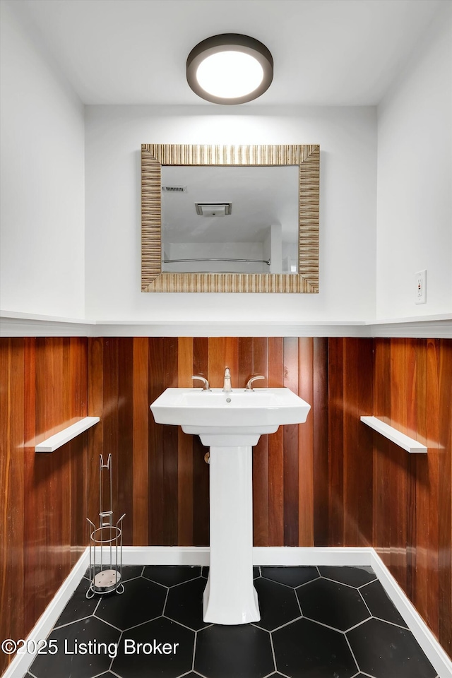 3407 Hillsboro Rd, Louisville, KY 40207 - detailed view of wainscoting, tile patterned floors, and wooden walls