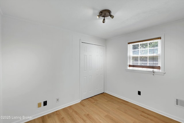3407 Hillsboro Rd, Louisville, KY 40207 - unfurnished bedroom featuring light wood finished floors, a closet, and ornamental molding