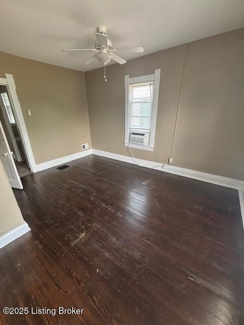 1842 Deer Park Ave, Louisville, KY 40205 - unfurnished room with dark wood finished floors, ceiling fan, and cooling unit