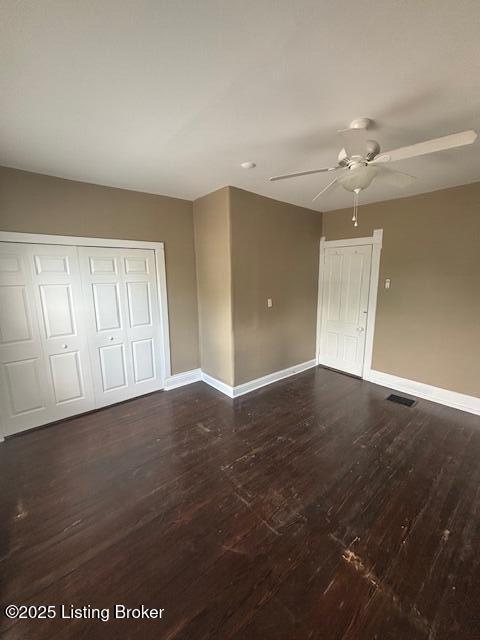 1842 Deer Park Ave, Louisville, KY 40205 - unfurnished bedroom with dark wood finished floors, a closet, and ceiling fan