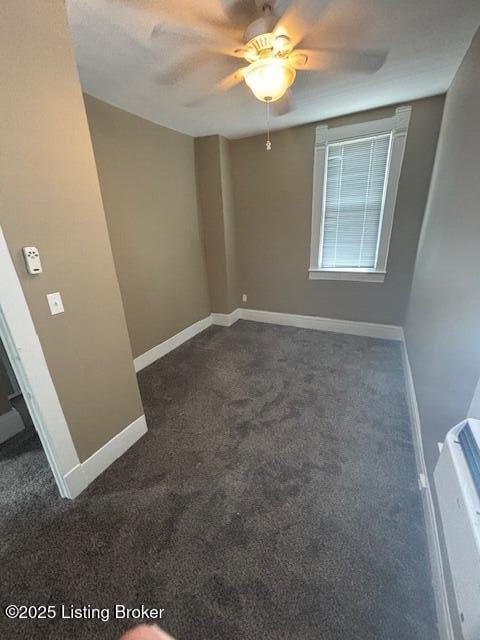 1842 Deer Park Ave, Louisville, KY 40205 - spare room with dark colored carpet and a ceiling fan