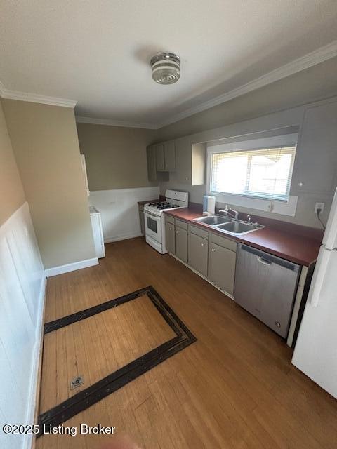 1842 Deer Park Ave, Louisville, KY 40205 - kitchen featuring white appliances, dark wood-style floors, crown molding, and dark countertops