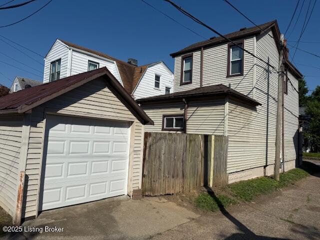 1842 Deer Park Ave, Louisville, KY 40205 - view of home's exterior with an outbuilding, driveway, and a detached garage