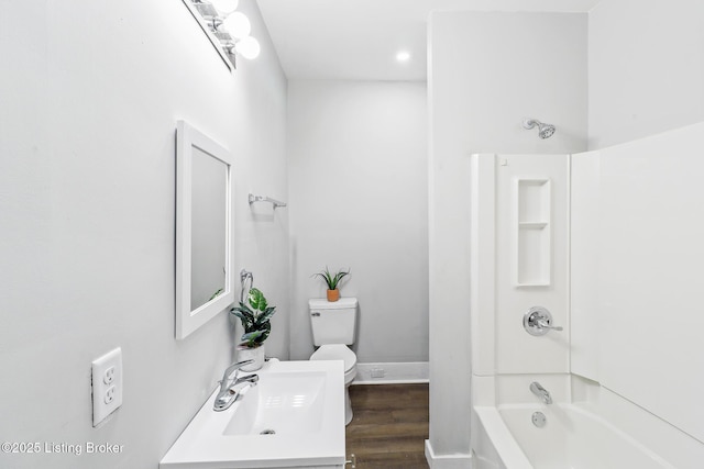 2522 Wilson Ave, Louisville, KY 40210 - full bath featuring shower / tub combination, wood finished floors, and vanity