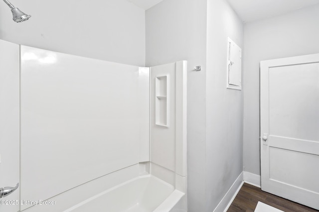 2522 Wilson Ave, Louisville, KY 40210 - bathroom featuring shower / washtub combination and wood finished floors