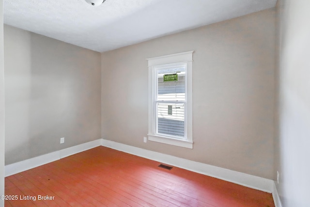 2522 Wilson Ave, Louisville, KY 40210 - unfurnished room featuring hardwood / wood-style floors
