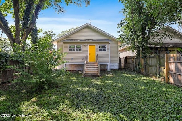 2522 Wilson Ave, Louisville, KY 40210 - rear view of house with entry steps and a fenced backyard