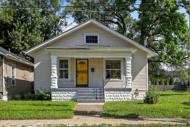 2522 Wilson Ave, Louisville, KY 40210 - view of front of house with a porch and a front lawn