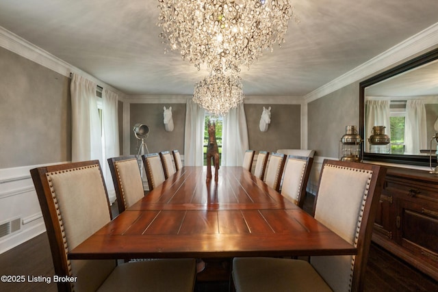 10020 Oak Grove Rd, Louisville, KY 40291 - dining area featuring a chandelier, ornamental molding, wood finished floors, and a decorative wall