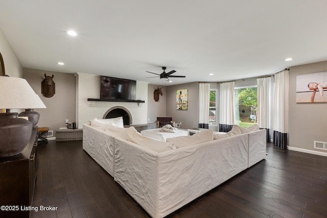 10020 Oak Grove Rd, Louisville, KY 40291 - living area with dark wood-style floors, a brick fireplace, a ceiling fan, and recessed lighting