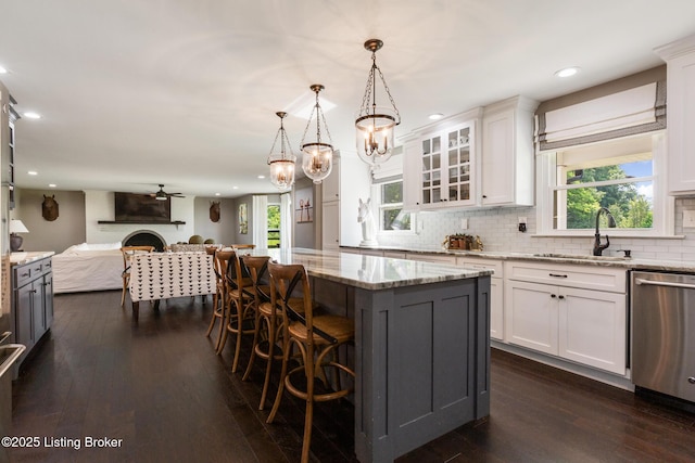 10020 Oak Grove Rd, Louisville, KY 40291 - kitchen featuring open floor plan, stainless steel dishwasher, recessed lighting, white cabinets, and backsplash