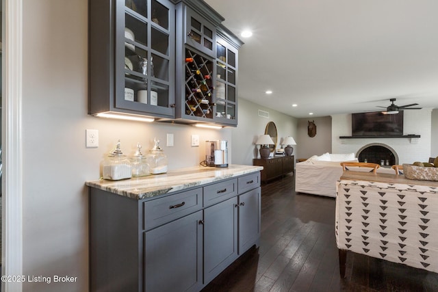 10020 Oak Grove Rd, Louisville, KY 40291 - indoor dry bar with ceiling fan, dark wood finished floors, recessed lighting, and a brick fireplace