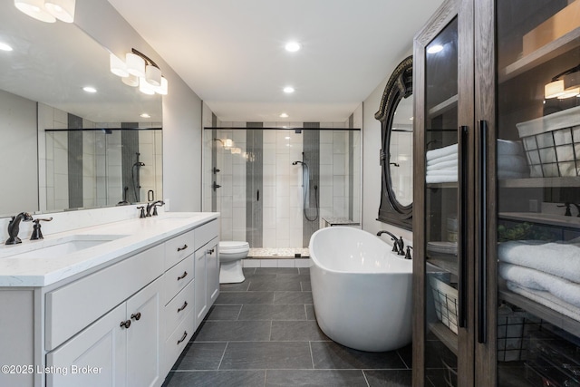 10020 Oak Grove Rd, Louisville, KY 40291 - bathroom with a shower stall, a freestanding bath, double vanity, tile patterned flooring, and recessed lighting