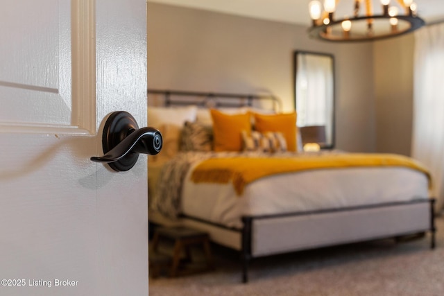 10020 Oak Grove Rd, Louisville, KY 40291 - carpeted bedroom with a chandelier
