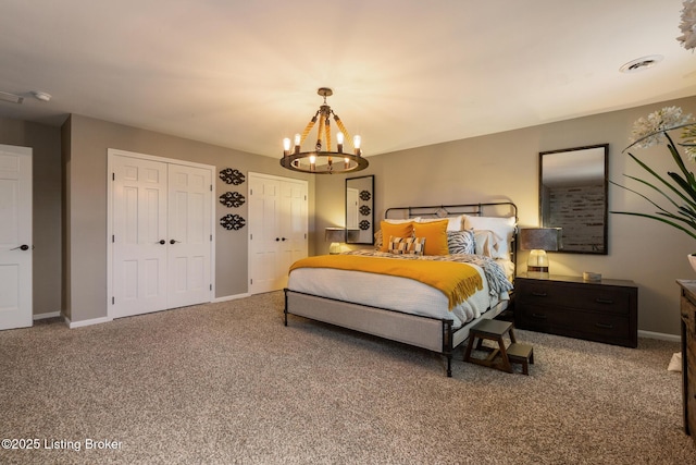 10020 Oak Grove Rd, Louisville, KY 40291 - bedroom with multiple closets, a chandelier, and carpet