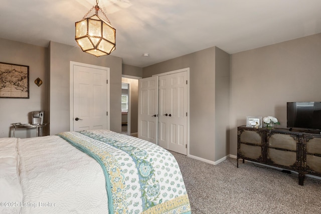 10020 Oak Grove Rd, Louisville, KY 40291 - carpeted bedroom with baseboards and a chandelier