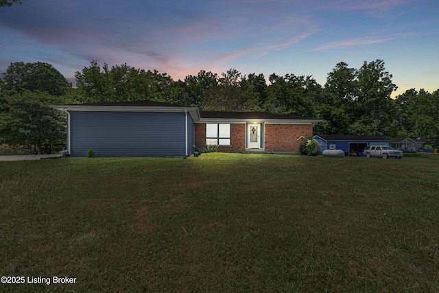 2625 Shumate Rd, Ekron, KY 40117 - view of front of home featuring a front lawn and brick siding