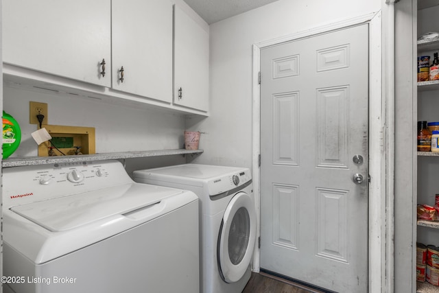 2625 Shumate Rd, Ekron, KY 40117 - laundry area with washing machine and dryer, cabinet space, and dark wood finished floors