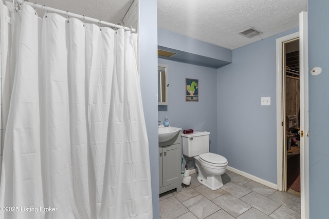 2625 Shumate Rd, Ekron, KY 40117 - full bath with vanity, tile patterned flooring, a textured ceiling, and curtained shower