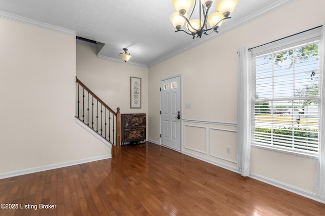 10008 Hornbeam Blvd, Louisville, KY 40228 - foyer featuring a chandelier, crown molding, wood-type flooring, and stairway