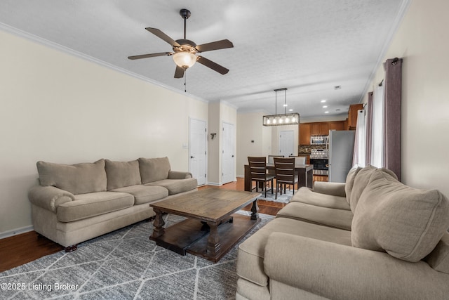 10008 Hornbeam Blvd, Louisville, KY 40228 - living area with a ceiling fan, dark wood-style floors, and ornamental molding