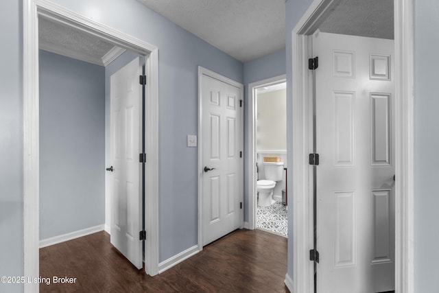 10008 Hornbeam Blvd, Louisville, KY 40228 - corridor with dark wood-type flooring and a textured ceiling