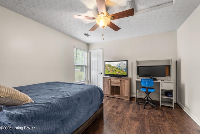 10008 Hornbeam Blvd, Louisville, KY 40228 - bedroom with dark wood finished floors, a textured ceiling, a ceiling fan, and an office area