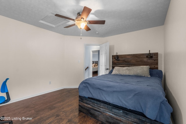 10008 Hornbeam Blvd, Louisville, KY 40228 - bedroom featuring wood finished floors, a textured ceiling, a ceiling fan, and attic access