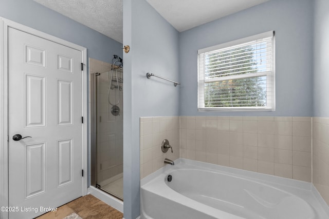 10008 Hornbeam Blvd, Louisville, KY 40228 - full bath with a garden tub, a stall shower, and tile patterned floors