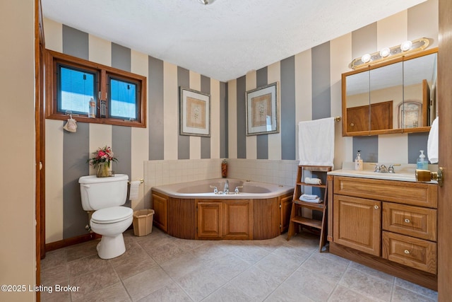 4333 Wax Rd, Clarkson, KY 42726 - bathroom featuring wallpapered walls, a garden tub, vanity, a textured ceiling, and tile patterned flooring