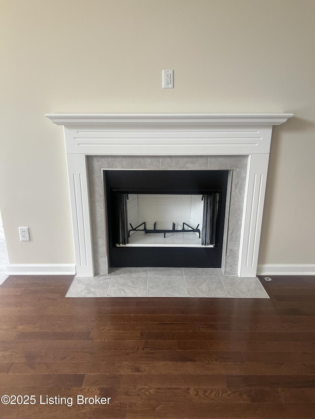 9403 Alex Ct, Louisville, KY 40299 - detailed view of wood finished floors and a tile fireplace