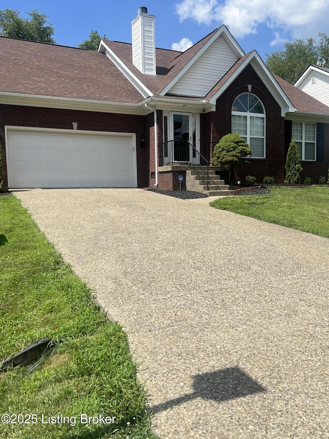 9403 Alex Ct, Louisville, KY 40299 - single story home featuring concrete driveway, brick siding, a garage, a chimney, and a shingled roof