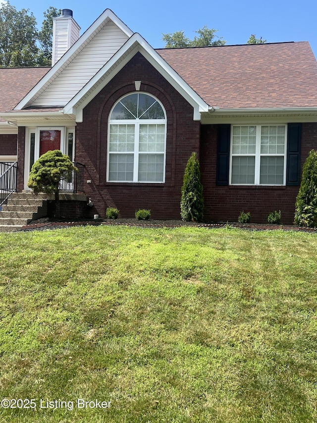 9403 Alex Ct, Louisville, KY 40299 - ranch-style home with brick siding, a chimney, a front lawn, and a shingled roof