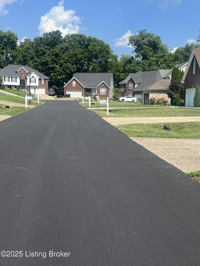 9403 Alex Ct, Louisville, KY 40299 - view of asphalt road featuring a residential view