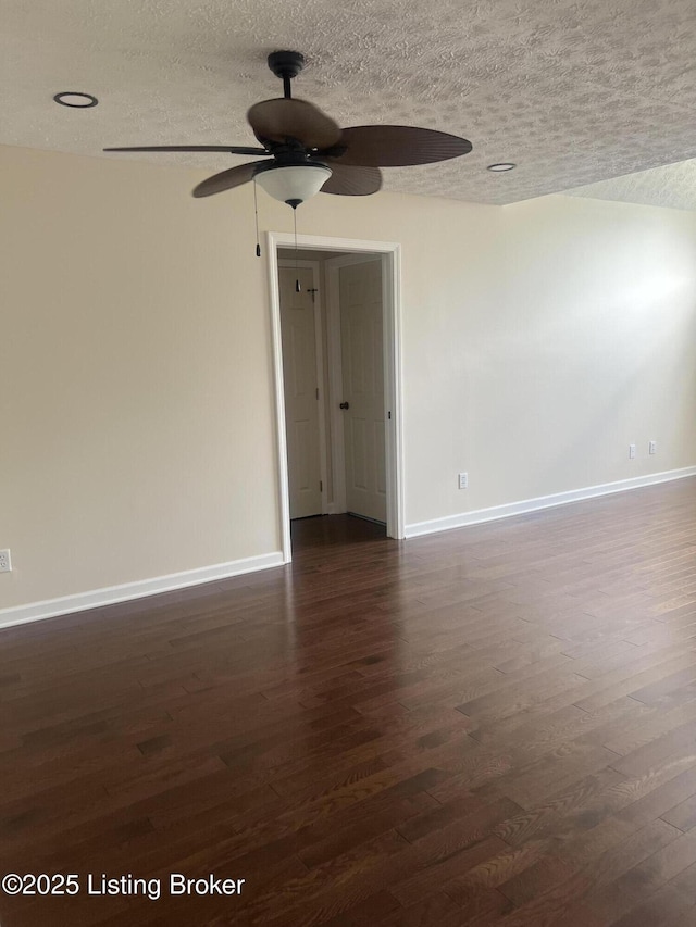 9403 Alex Ct, Louisville, KY 40299 - empty room featuring dark wood finished floors, a textured ceiling, and a ceiling fan