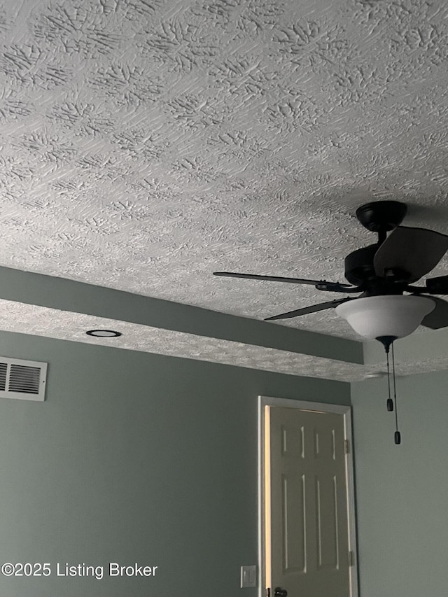 9403 Alex Ct, Louisville, KY 40299 - detailed view of a textured ceiling and ceiling fan