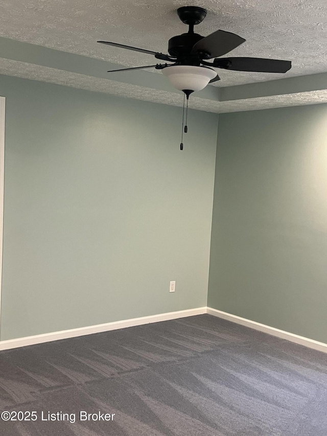 9403 Alex Ct, Louisville, KY 40299 - empty room with a ceiling fan, dark carpet, and a textured ceiling
