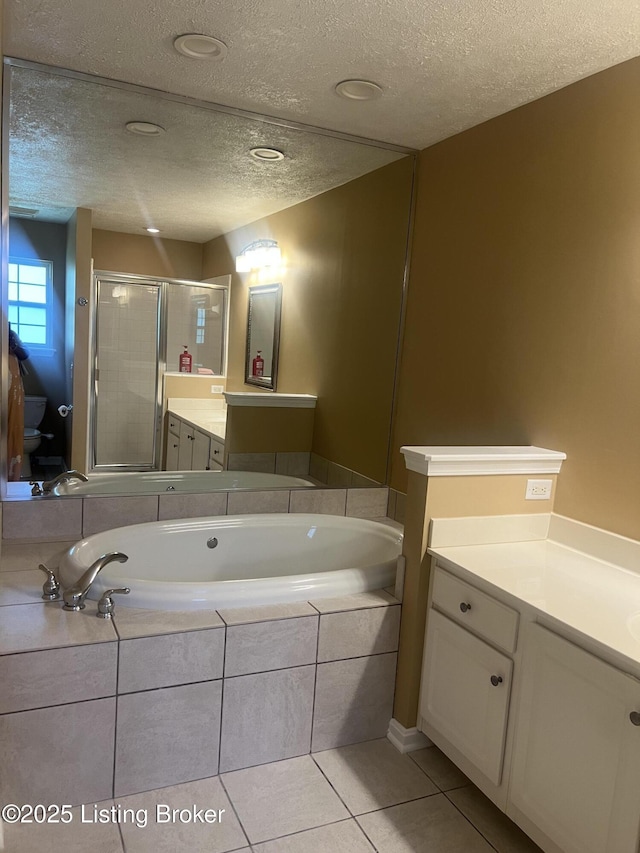 9403 Alex Ct, Louisville, KY 40299 - bathroom featuring vanity, a textured ceiling, a bath, a shower stall, and tile patterned floors
