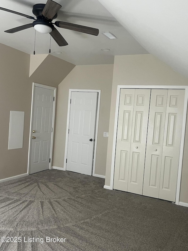 9403 Alex Ct, Louisville, KY 40299 - unfurnished bedroom featuring carpet, vaulted ceiling, a closet, and a ceiling fan