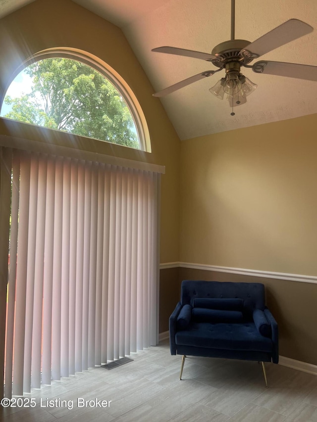 9403 Alex Ct, Louisville, KY 40299 - living area with vaulted ceiling, a ceiling fan, and wood finished floors